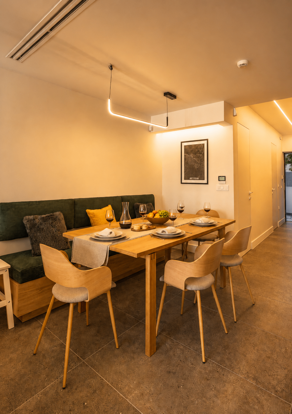 Niriis Suite 2 dining area with oak table and bench seating