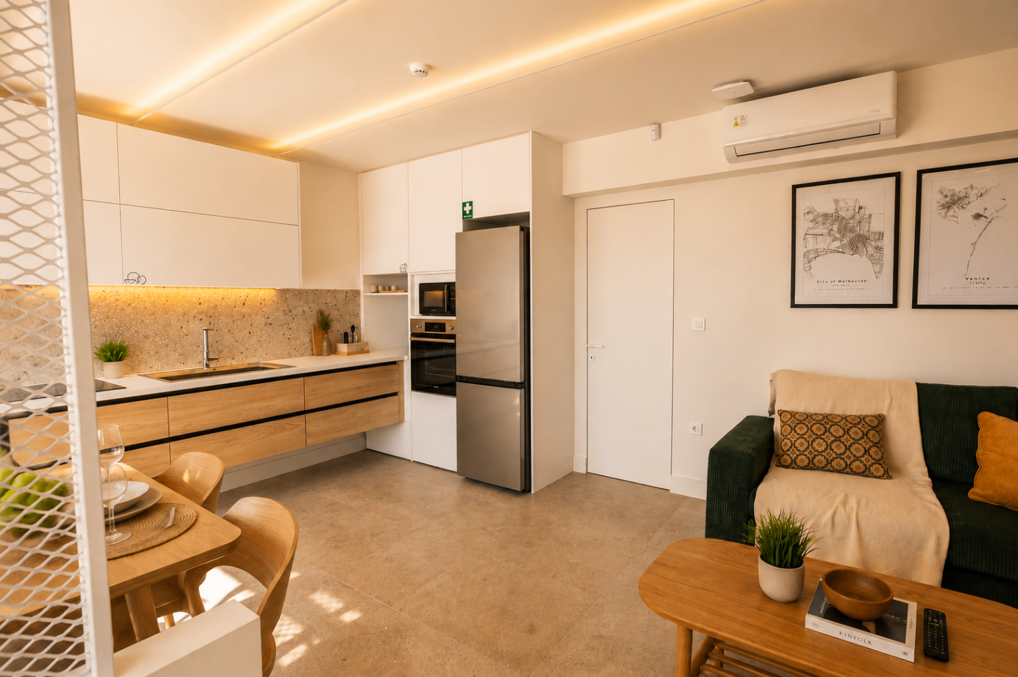 Niriis Suite 3 kitchen and lounge with oak cabinetry and soft natural light